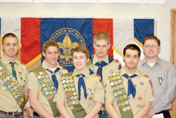 Scout ceremony celebrates new Eagles, and suprises one with award he missed out on when deployed several years ago 