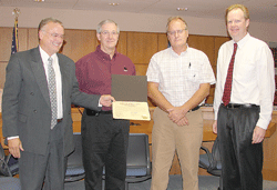 Fire truck manufacture gets county board certificate of recognition for eight decades of employing people in Chisago County 