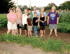 Kids and mentors find common ground in the vegetable garden 