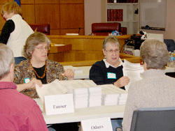 Hand re-count sends six 'challenged' ballots to state