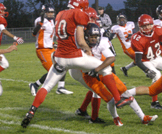 Hawks bring the hammer, but Vikes hang tough in close loss