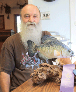 Sweepstakes carver credits patience and appreciation for nature in wowing judges