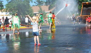 Kids loving the weather at NB's Midsummer Days
