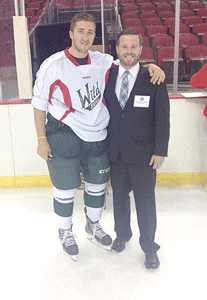 Wildcat alumni on-ice, in the office, with Wild farm team