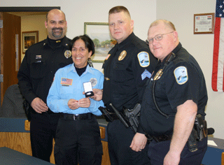 Local woman honored with Police Lifesaving Award