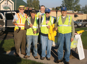 Lions prowling around town, picking up garbage