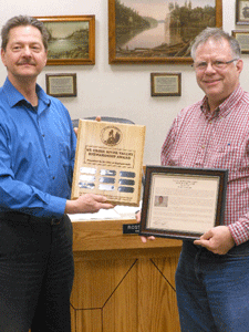 Council honors Pastor Schumann; discusses business park incentives
