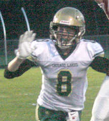 Chisago Lakes fights through wet homecoming to beat Princeton 21-12