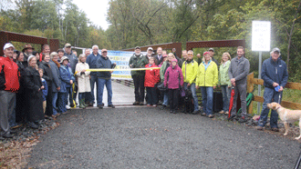 Commerce; conservationists and county officials come together at opening of east end trail segment