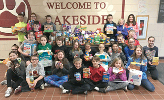 Lakeside passes a ton in food drive items