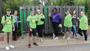 NB students helping clean up the community