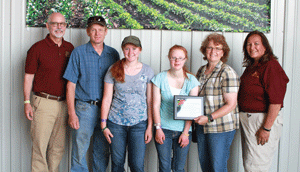 Operators of multi- generation farm named Chisago County Farm Family of the Year