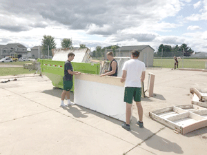 CL football players helping out around town