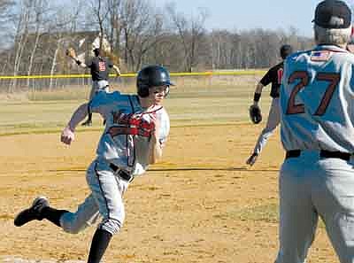 Vikings go to extra-innings, pick up first win of the season