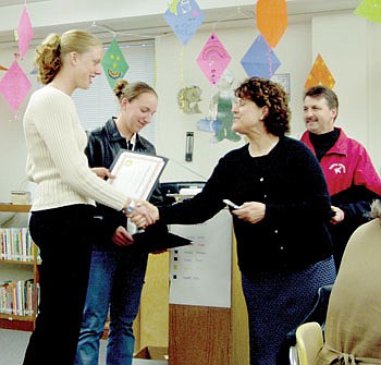 NB fee cap $500; volleyball coach hired