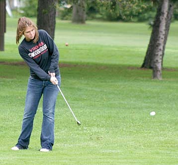 NB girls and boys golf come up big on greens 