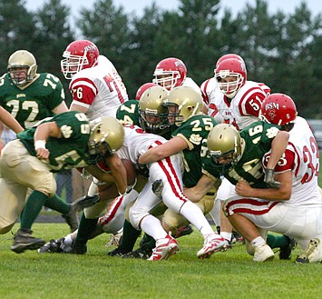 Wildcats use ground game to grind out win over BSM