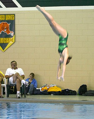 Wildcats swim well against Cooper 