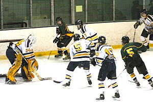 Wildcat hockey team dominates N. St. Paul, then gets dominated by Totino