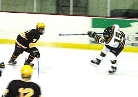 Wildcat boys skate to two conference wins 