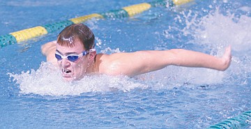 Wildcat swimmers keep dual-meet streak alive 