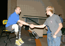 Iraq veteran's loss of legs doesn't diminish his belief in the military, he tells C.L. high school students