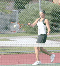 Wildcats snatch first conference win