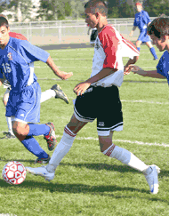 Grand scores nine in four games as NB goes 3-1